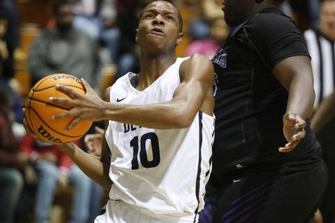 Sophomore shooting guard Jamil Burton led the Blue Devils in scoring with 21 points in Elbert County’s 71-64 first-round region tournament win over Monticello Feb. 3 at Banks County in Homer. (Photo by Cary Best)