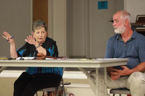 Bowman Mayor Roberta Rice, Council Member Chris Johnson discuss city business in meeting Monday night. (Photo by Scoggins)