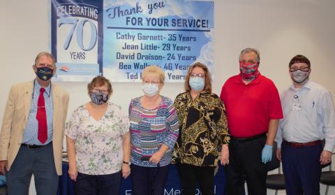 Five employees at Elbert Memorial Hospital are retiring with a combined 141 years of experience are (L-R) David Draisen, Bea Wallace, Jean Little, Cathy Garnett and Ted Dove. At the end of the line is EMH Chief Executive Officer Kerry Trapnell.
