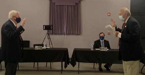 Mayor Larry Guest swore in Mayor Pro Tem Carey Butler Monday night in the first meeting of the year for the council. The meeting was held in the Elberton Arts Center and as you can tell from the swearing in ceremonies, the council used social distancing protocols. (Photo by Scoggins)