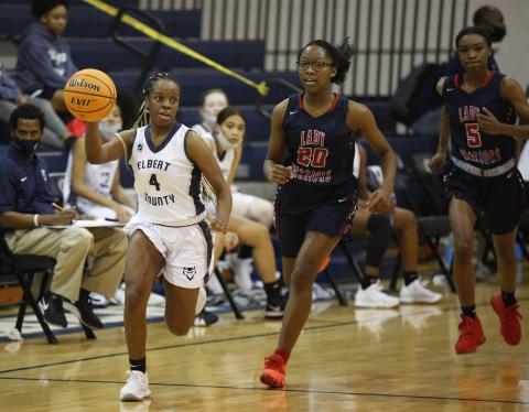 Sophomore Rere Allen takes the ball down the court against Grovetown Dec. 12 in the Elbert County Middle School Gym. (Photo by Scoggins)