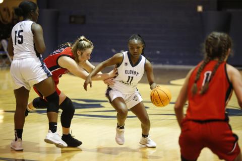Sophomore Terrace Hester rushes down the court against a Rabun County Lady Cat in Friday’s competiton in the Inferno. (Photo by Scoggins) 