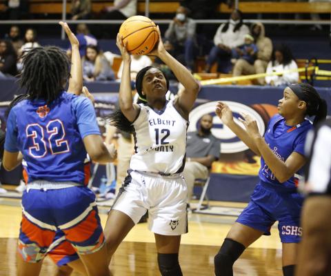 Sophomore Brenasia Faust attempts a field goal between a trio of Lady Jaguars in Friday’s non-region competition against Cedar Shoals in the Inferno. (Photo by Scoggins) 