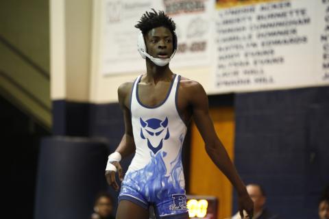 Senior Jamal Rucker won the state championship in the 126-pound division in Macon Wednesday, Feb. 10. (Photos by Scoggins) 