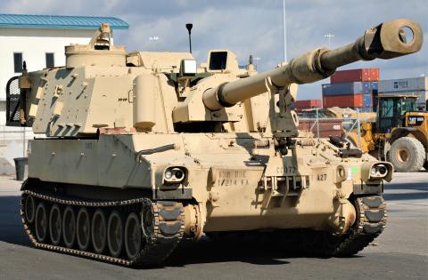 An M109A6 Paladin howitzer assigned to the Hartwell-based Alpha Battery, 1st Battalion, 214th Field Artillery Regiment, 648th Maneuver Enhancement Brigade, Georgia Army National Guard moves to a loading dock May 10, 2021, in Jacksonville, Florida. The self-propelled howitzer was one of over 200 Georgia Army National Guard vehicles that deployed to Morocco for participation in exercise African Lion 21. 