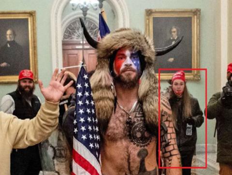 The Federal Bureau of Investigation’s “statement of facts” says federal authorities have “probable cause” to believe that Savannah Danielle McDonald is shown in this Jan. 6 photo with Jacob Chansley, better known as the “QAnon Shaman,” in the U.S. Capitol Building. The FBI included this photo with its statement of facts announcing the arrest of McDonald of Elberton and Nolan Harold Kidd of Crawford. The federal agency added the red box in the photograph to identify McDonald. (Photo provided by FBI)