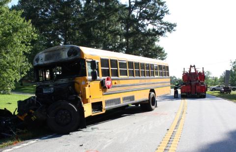Charred remains of an Elbert County school bus were towed away after last Wednesday’s traffic fatality on Georgia Highway 368 (Anderson Highway).