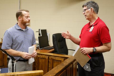 County Commission Chairman Lee Vaughn (left) and recently selected County Administrator Phil Pitts talk after a recent meeting of the Elbert County Board of Commissioners. Pitts says he wants to work closely with the City of Elberton and the City of Bowman and make sure the Elbert County Senior Center continues to operate smoothly. Pitts will take over with the coming retirement of Bob Thomas, who has served as county administrator for 15 years. (Photo by Scoggins)