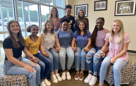 Homecoming court members are (seated, L-R) Jade Partain, Taniah Cunningham, Lacie Hall, Tariyah Allen, Katie Hobbs, Jordan Glaze and Karis Gary. On the back row are class representatives (L-R) sophomore Georgia Phillips, junior Jamia Allen and freshman Hannah Brady.