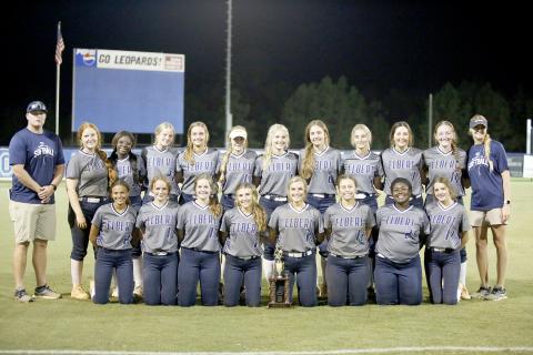 The 2021 Lady Devils softball team poses with the second-place trophy Saturday, Oct. 9 after falling 1-0 to Banks County in the region championship game.