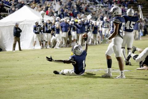 Quan Moss reacts to scoring a touchdown for the Blue Devils during the team's 26-14 loss in the first round of the GHSA state playoffs in the Granite Bowl Friday, Nov. 12.. (Photo by Scoggins)