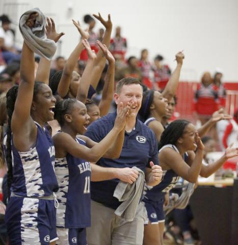 Head Coach Josh Jones and the Lady Devils' bench celebrate after defeating Callaway High School Tuesday, March 1 to advance the team to the Final Four round for the first time since 1966. (Photo by Scoggins)