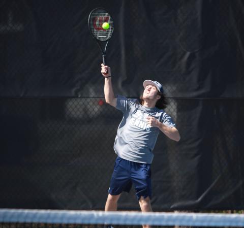 The Devils tennis team, including Alex Bennett (right) finished fourth in the region. Both teams were scheduled to advance to the first round of the GHSA state playoffs Tuesday. (File photos by Scoggins) 