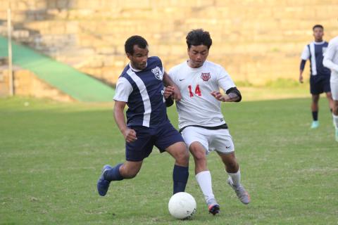 Jamaze Hall attempts to work the ball away from a Rabun County defender during the Devils’ 10-0 loss against Rabun County Friday, April 8. (Photo by Wells)