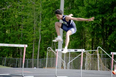 Track Devil Chastain Williams finished with a season best in the 300 meter hurdles during the Hart County meet Thursday. (Photo by Scoggins)