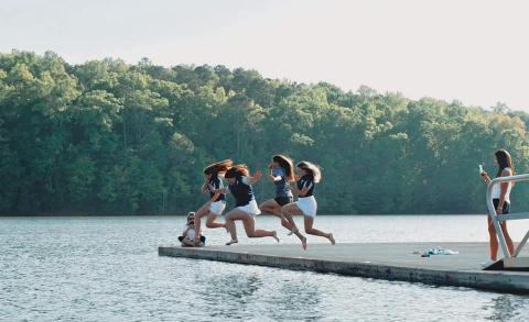 After winning the Area 4AA championship Wednesday, April 27, the Lady Devils golf team took a plunge into Lake Richard B. Russell. Taking the plunge are Lady Devils (L-R) Emalise Andrews, Ava Dye, Abby Bryant and Ellie Wheeler. 