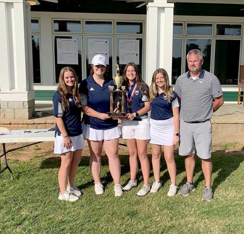 Elbert County’s Lady Devils took home the Area 4AA championship trophy Wednesday, April 27 at Arrowhead Pointe Golf Course after defeating defending state champion Lovett. 