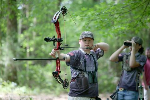 Nathan Hendrix, who is also a senior at Elbert County Comprehensive High School, signed a scholarship to continue his archery career at Emmanuel College after graduation. (Photos by Scoggins) 