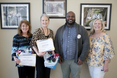 Pictured during a surprise presentation honoring them as the Emmanuel College Cooperating Teachers of the Month for May were (L-R) teachers Kerri Wiliams, Kelly Gary, nominating student teacher Isaiah Garnett and Director of Field Experience at Emmanuel Debbie Maxwell. (Photo by Scoggins)