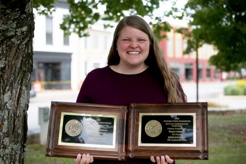 Editor Rose Scoggins took home first place out of all the weekly newspapers in the state for photo portfolio and first place in the The Star’s Division E for sports photo. (Photo by Evans) 