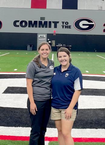 Head Athletic Trainer Sarah Fuller (left) and student assistant trainer Callie Moss (right) recently attended a free training course at the University of Georgia’s indoor athletic facility in Athens.