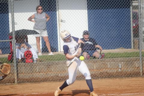 Lilly Ray connects with the ball against Lake Oconee Aug. 4 after hitting a two-run homer in the pre-season scrimmage Aug. 2.
