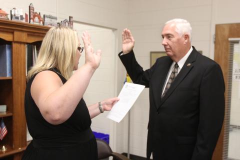 David Hunt (right) was sworn in by Elbert County Probate Judge Stephanie Hewell (left) Tuesday, Aug. 16 as the newest commissioner on the Elbert County Board of Commissioners. Hunt was recently appointed by the board to fill the remaining term on the District 1 seat after it was vacated due to former commissioner Horace Harper’s passing in June. (Photo by Scoggins) 