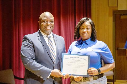 Elberton’s MiYako Ardister (right) recently graduated as a juvenile corrections officer. Ardister is pictured with Georgia Department of Juvenile Justice Commissioner Tyrone Oliver. 
