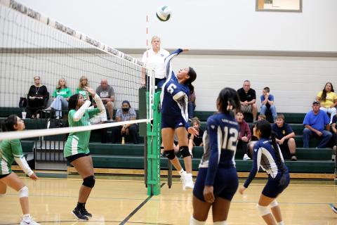 Lizett Nava jumps to spike the ball over the net during the Lady Devils’ win over Franklin County Thursday, Sept. 22 in Carnesville. (Photo by Scoggins) 