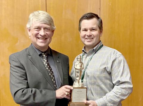 Elbert County’s Mark Wiles (left) received a Silver Smokey Award, the top honor for those working in wildfire prevention, in September. 