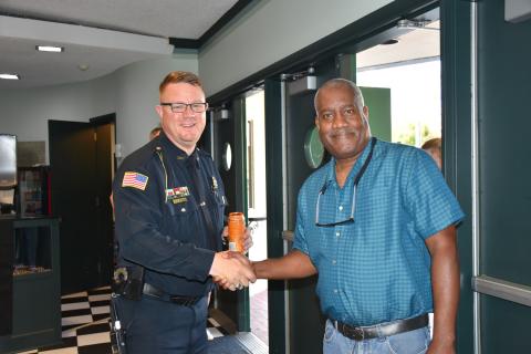 Elberton Police Chief Scott Marunich (left) shakes hands with Rev. John Barnett before the Faith and Blue event. (Photo by Christy David) 