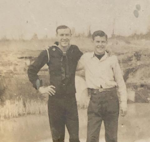 Eugene “Gene” Wallace (left) visits his brother, Ezra Wallace (right) on a short trip home during his time as a Navy Seabee in 1945.