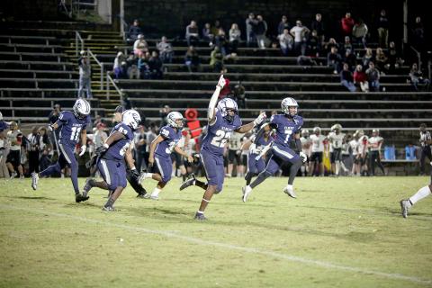 The Elbert County Blue Devils are headed to the second round of the GHSA state playoffs after a 31-7 win over Pepperell High School in the first round Friday, Nov. 11. (L-R) Christian Harris (No 11.), D.J. Raiford (No. 53), Miguel Rodriguez (No. 30), Malik Hill (No. 22) and L.J. Clark (No. 7) react to a play during the Devils’ win over the Dragons. (Photo by Scoggins)