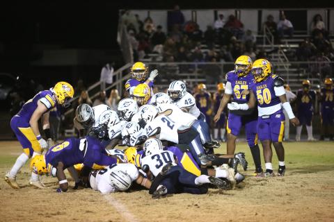 A Devil dogpile attempts to recover a fumbled ball during the last regular season game vs. Athens Christian Oct. 28. The Devils are looking to make it past the first round of the GHSA state playoffs Friday, Nov. 11. (Photo by Scoggins)
