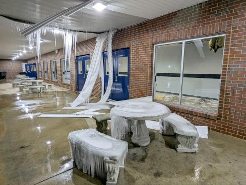 Left, pipes burst at Elbert County Middle School around Christmas Day, flooding 95 percent of the school and causing damage to other areas, including the inside and outside ceilings of the hall near the gym. (Photo by Scoggins)  