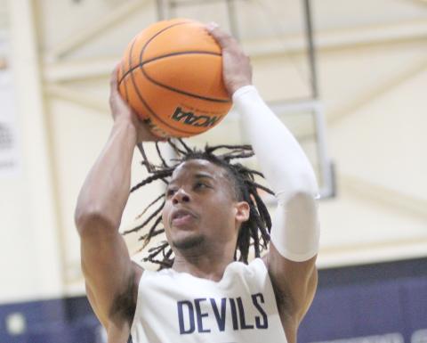 Senior Christian Harris looks to make a shot during the Devils’ game against Stephens County in the Inferno Jan. 3. (Photo by Wells)