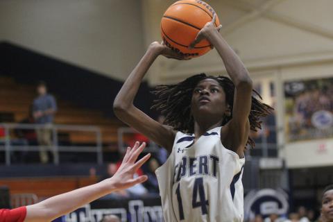 Seventh grade Ram Jaylin Morrison looks to the basket during the Rams’ game against Stephens County Middle School in the Inferno Jan. 5. (Photo by Wells)
