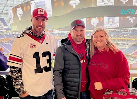 Pictured at the National Championship game inside SoFi Stadium in Inglewood, California are (L-R) Chase Tiller, Chris Morris and Sommer Morris