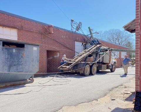 Elbert County Emergency Services Director Chuck Almond is pictured above inspecting the accident. (Photo courtesy of Elbert County Emergency Services)