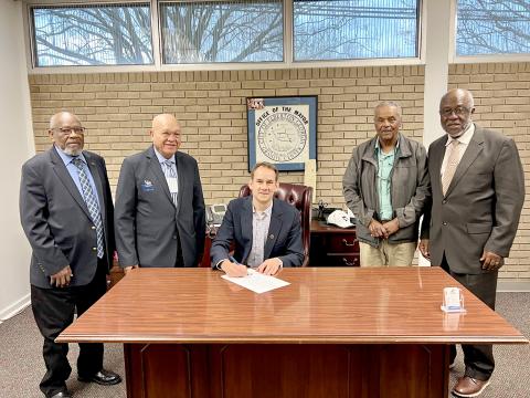 Pictured during the proclamation signing include (L-R) Hunt, Burton, Graves, John Hubbard and John Clark. 