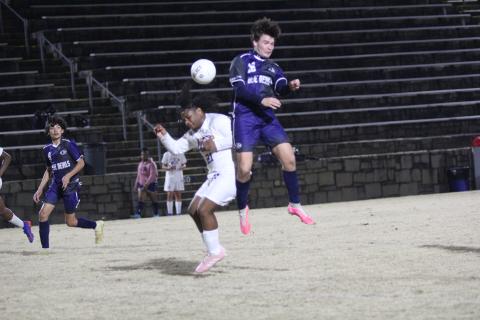 Junior Brandon Horne scored three goals during the Devils’ 8-4 win over Athens Christian Feb. 14 in the Granite Bowl. (Photo by Wells)