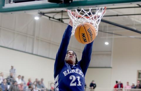 Senior Trustin Allen dunks the ball during the Devils’ loss to Tallulah Falls Feb. 17 during the Region 8A-D1 tournament. Allen scored his 1,000th point during the game that left the Devils finishing fourth in the region. (Photo by Scoggins)