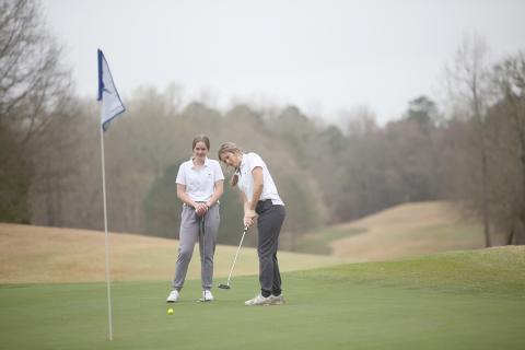 Lady Devils (L-R) Emalise Andrews and Ellie Wheeler finished in ninth place during the Blue Devil Shootout Feb. 25. (Photo by Wells)
