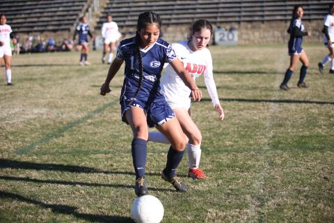 Vivian Salazar covers the ball from a Rabun County defender during the Lady Devils’ region matchup March 14.