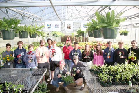 Students and instructors who helped grow the plants in Elbert County Comprehensive High School’s FFA Spring Plant Sale include (front row, L-R) Joey Biggs and Logan Carey and (back row L-R) Pat Moon, David Moore, Colsen Moore, Jaeden Smith, Malec Scarborough, Jayeveon Franklin, Jose Rodriguez, Taryn Hurndon, Kendall Dale, Conner Holland, Hayden Marunich and Asher Jones. (Photo by Wells)  Front Row L-R Joey Biggs and Logan Carey