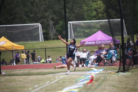 Lady Devil Marika Glaze qualified for the upcoming sectional meet in Barnesville May 6 after she won the region championship in discus with a throw of 108 feet, 1 inch. Head Coach Sid Smith said Glaze is the No. 1 discus thrower in the state for Class A Division 1.  (Photo by Wells) 