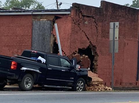 A single vehicle accident cause damage to the old Wray’s Drug Store building on the Bowman Square Sunday morning. (Photo courtesy of Elbert County Emergency Services)