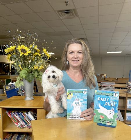 Elbert County Primary School media specialist and local author Michelle Scarborough has published her third book in her “Crazy Daisy” series inspired by her pet Maltese, Daisy. (Photo by Hall) 
