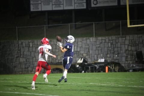Eli Harris catches a 40-yard touchdown pass in Elbert County’s 55-35 loss to Madison County Aug. 25. Harris finished with four catches for 65 yards and a touchdown in the loss. (Photo by Wells)