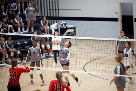 Sophia Vargas leaps as she spikes the ball in Elbert County Middle School’s 2-0 win over Rabun County Aug. 28. (Photo by Wells)